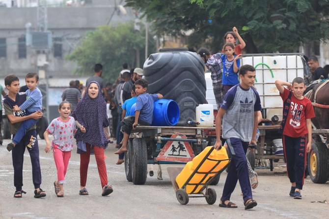 Gazans Break Into Aid Centers Taking Flour, Supplies, UN Says｜Arab News ...