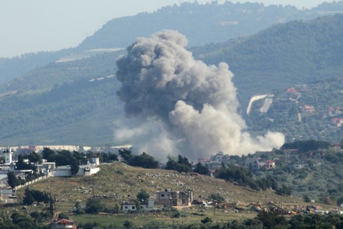 Smoke billows from the site of an Israeli airstrike on the southern Lebanese village of Kfar Kila near the border on May 14, 2024. (AFP)