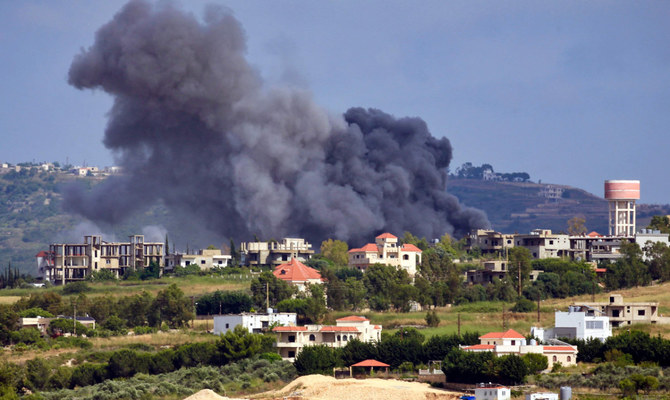 Smoke billows from the site of an Israeli airstrike on the Lebanese village of Jebbain, near the border with Israel on May 25, 2024, amid ongoing cross-border clashes between Israeli troops and Hezbollah fighters. (AFP)